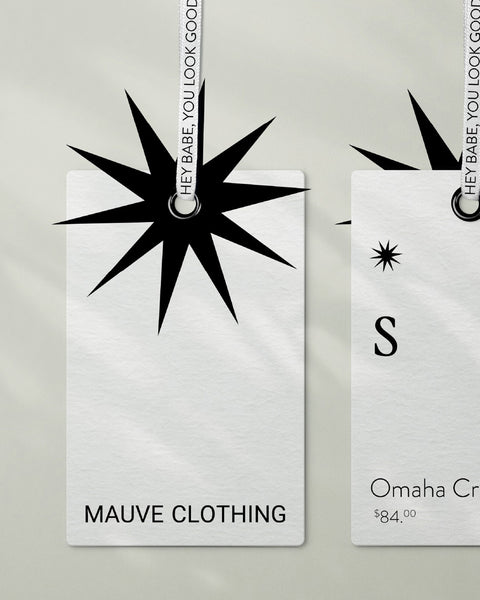 Closeup of two retail clothing tags