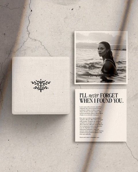 Jewelry packaging box to the left of two black and white inserts