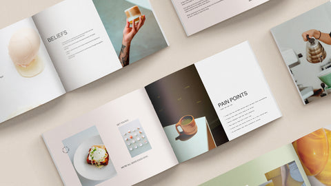 Various booklets showcasing elements of a brand presentation for an all-day breakfast restaurant